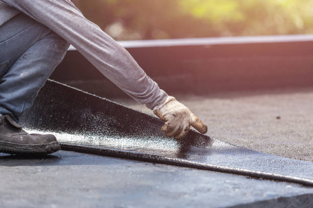 Professional Waterproofing technician working in Oxford, WI